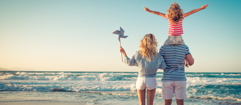 Happy family on a beach on a summers day