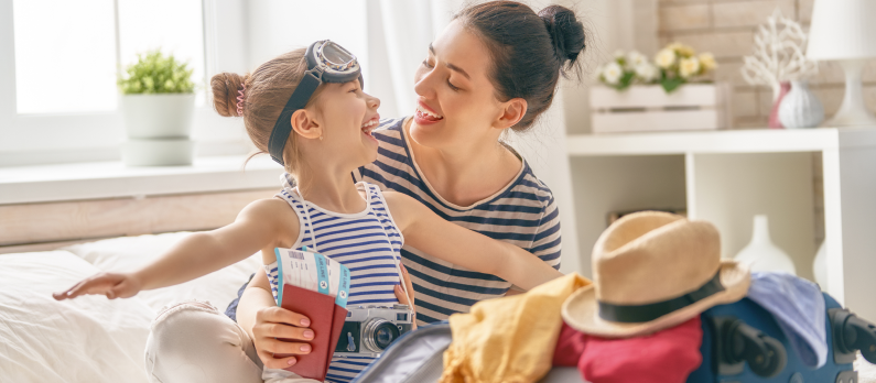 Mum and daughter packing for trip