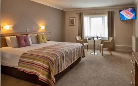 The Lodge Hotel Bedroom